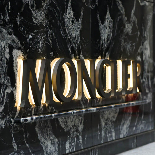 Custom backlit lobby signs for hotels, offices, and retail spaces