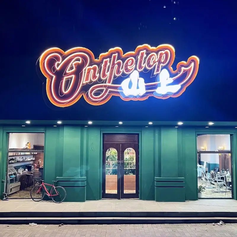 Glowing marquee neon letters for salon signage