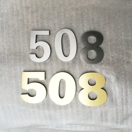 Metal house number fixtures