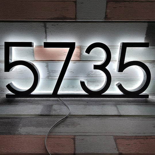 Outdoor rated backlit address plaque with IP65 waterproofing