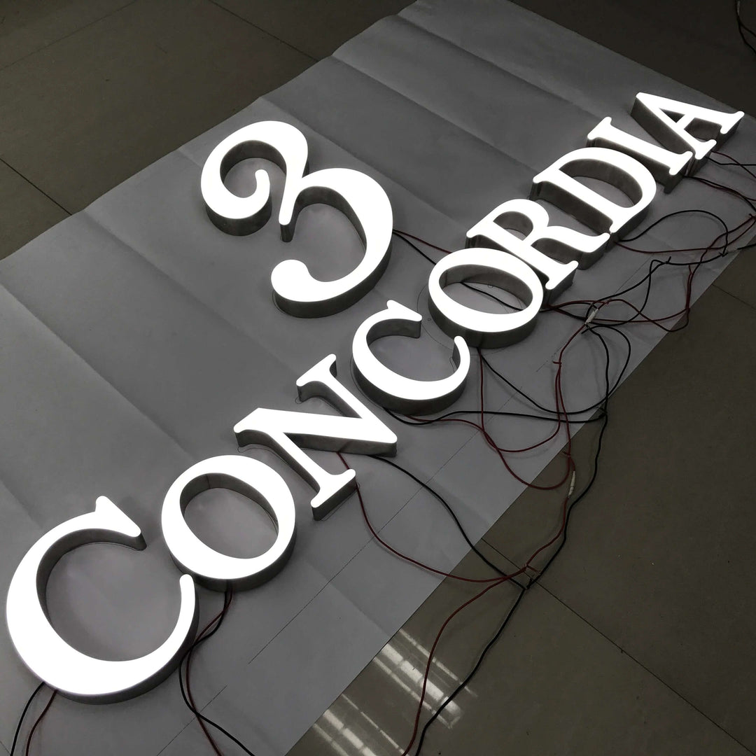 Stainless Steel Front Lit Channel Letter Sign with Lighted House Numbers for Night Visibility  