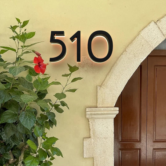 backlit house sign